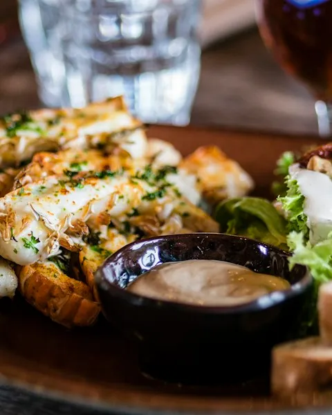 Grilled halloumi and vegetables on a shared plate
