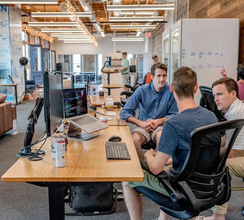 People reviewing a project dashboard