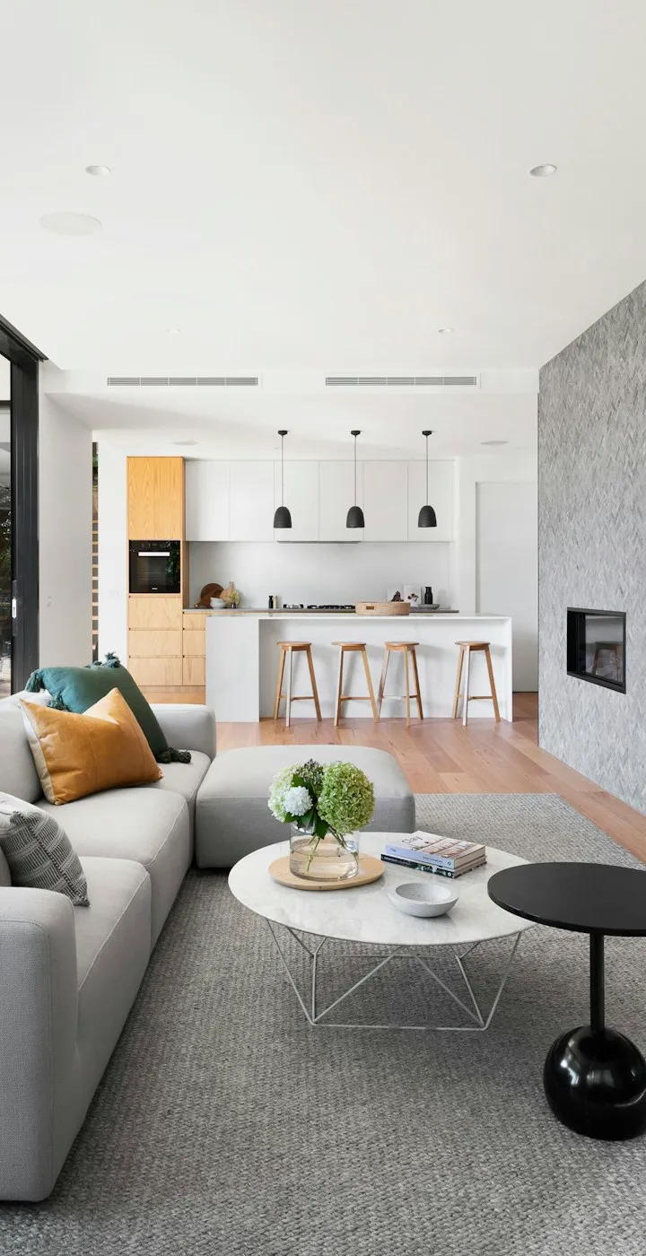 Warm modern home with wide windows and natural timber details